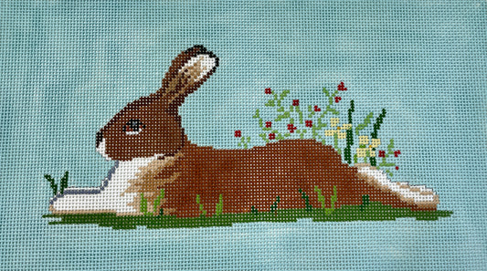 Bunny Laying Down in Flowers on Turquoise