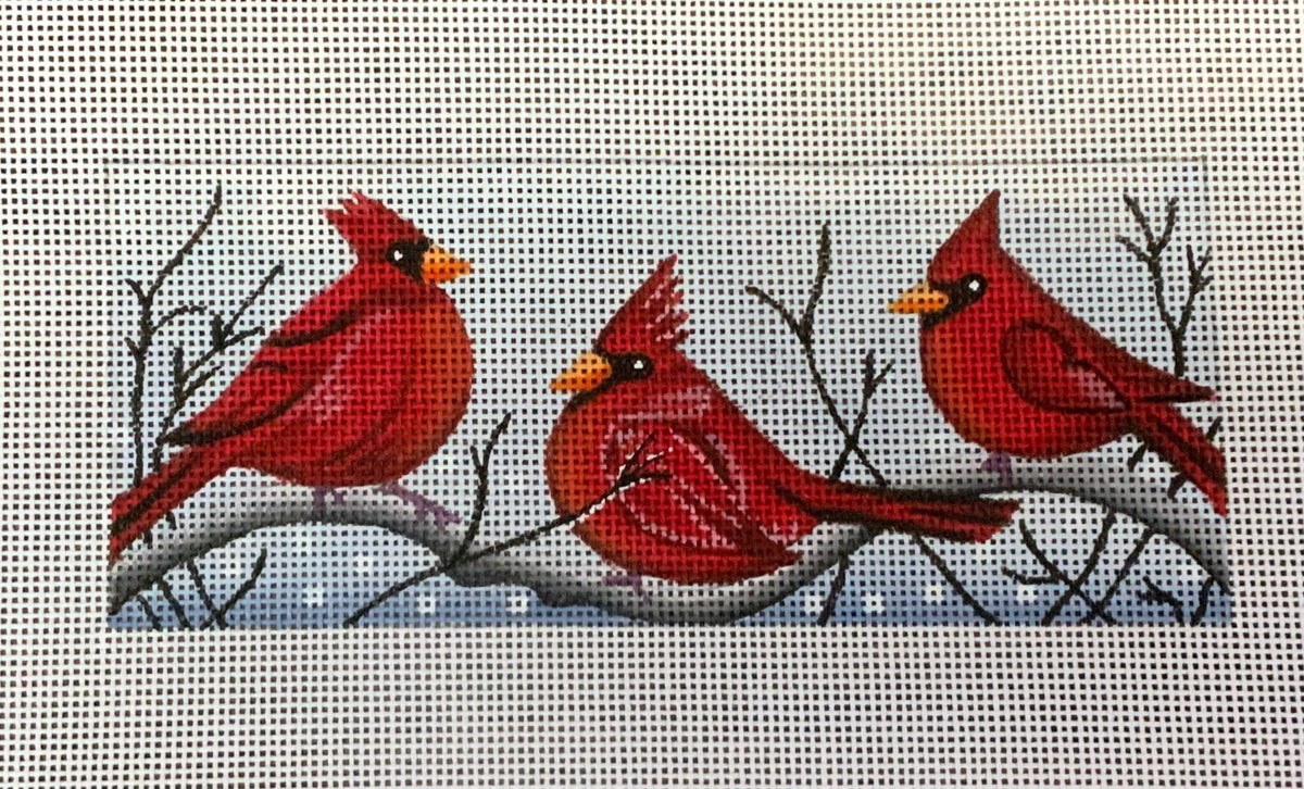 3 cardinals in snow